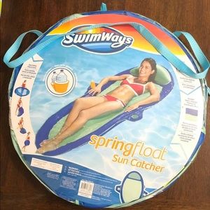 Swimways green/blue women’s spring sun catcher float with two cup holders.